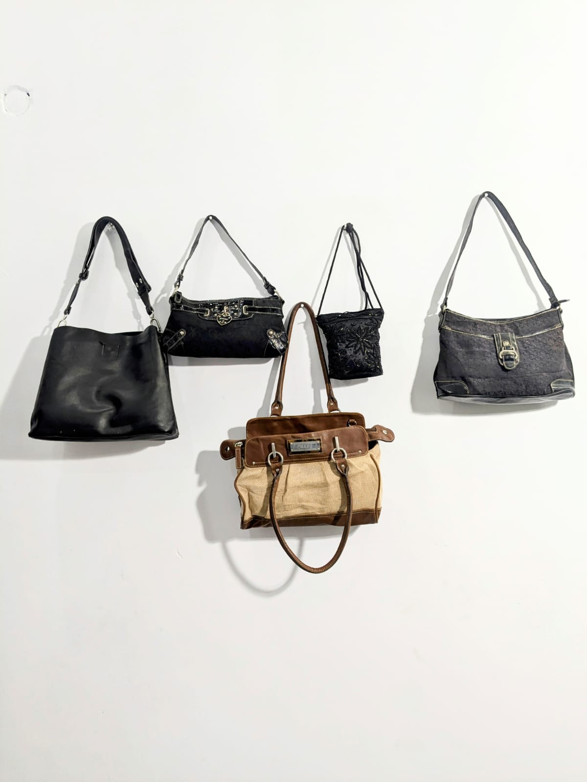 TV-128
LEATHER HAND BAGS
-9P