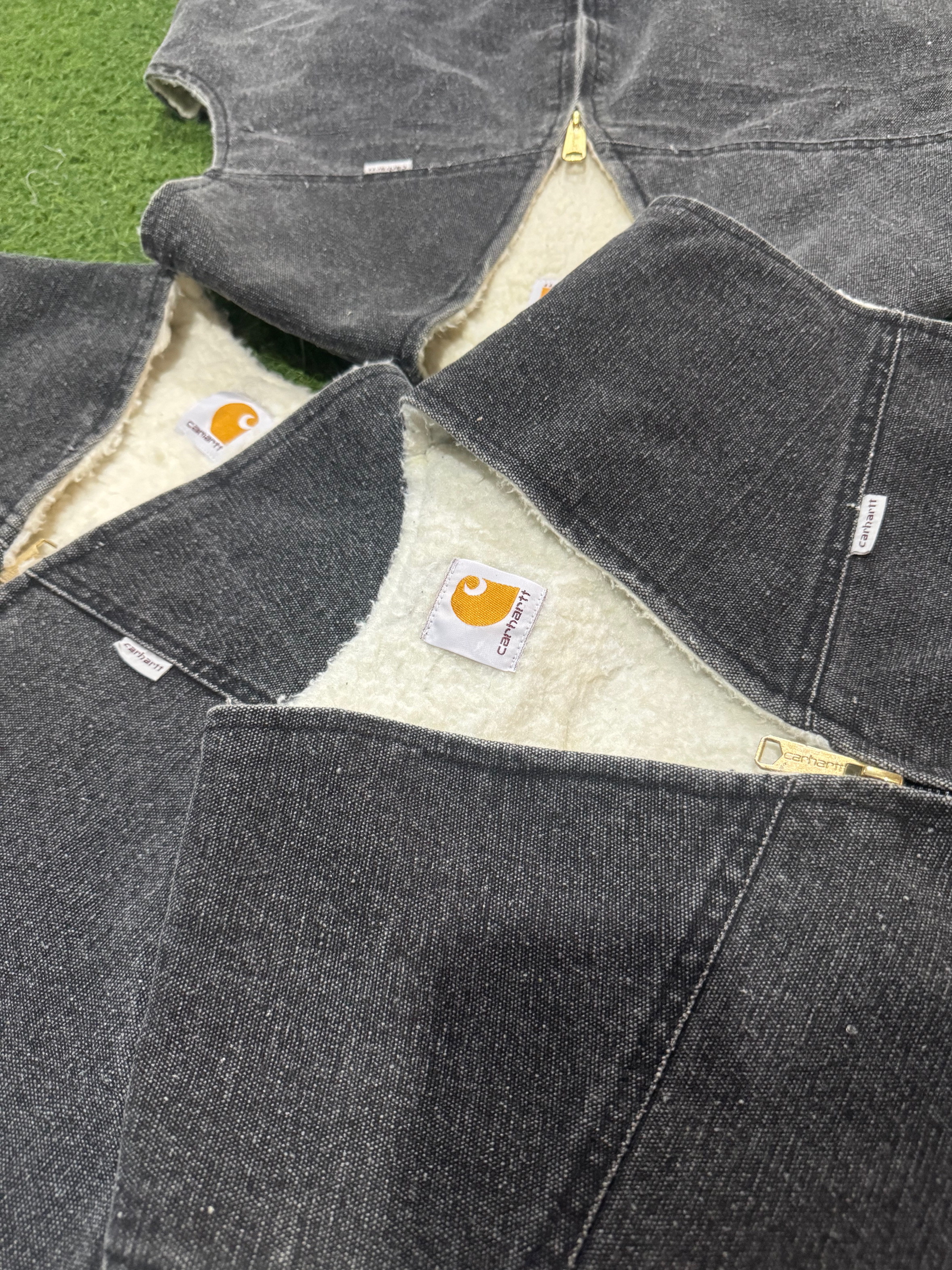 Rework style body warmers carhartt acid wash black..