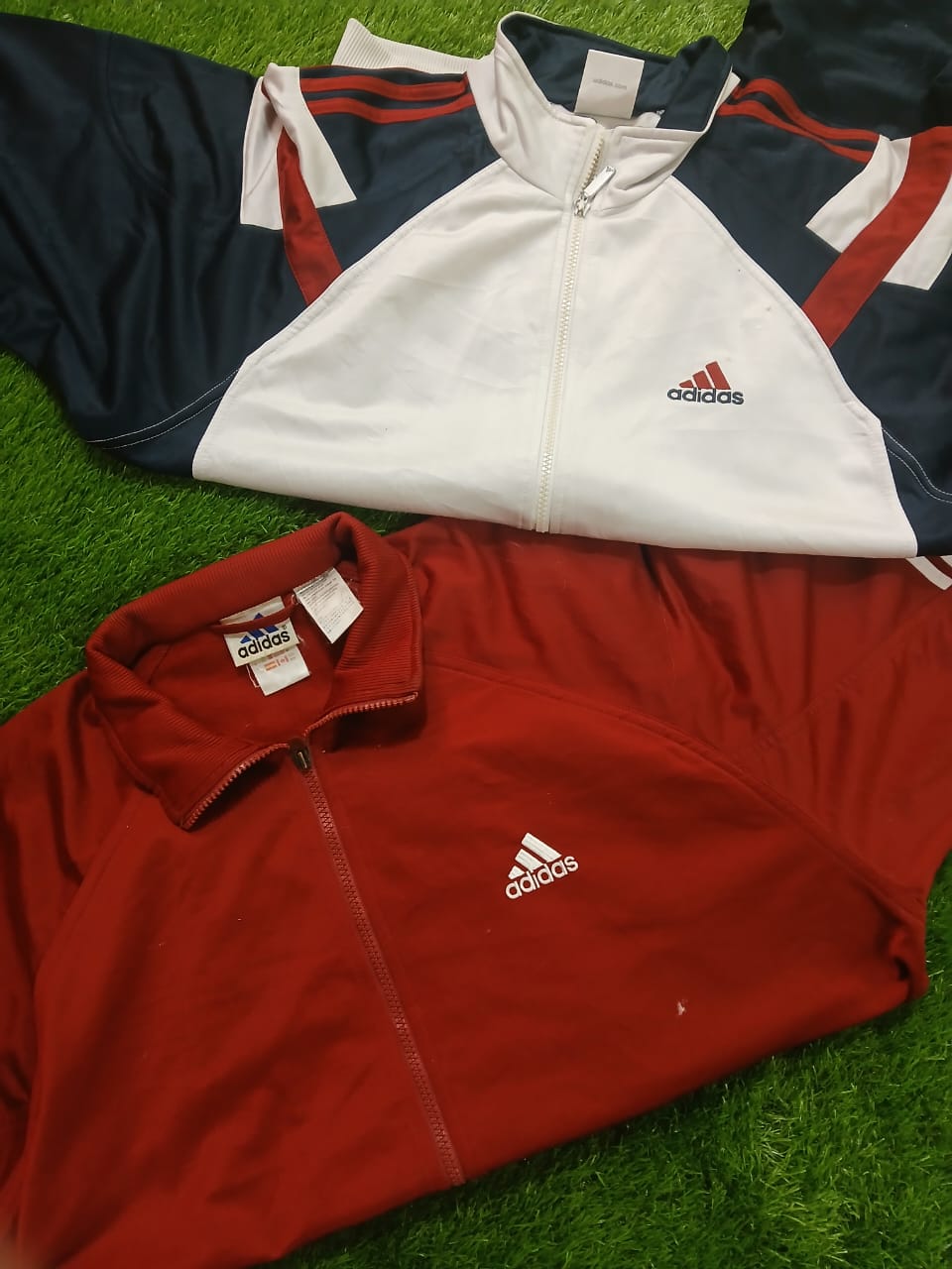 Giubbotti a vento e giacche da pista Adidas